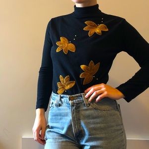 Pearl and floral appliqué black mock neck